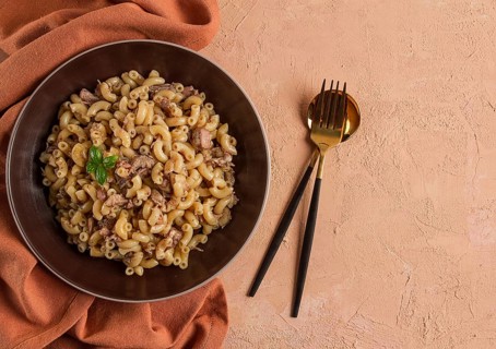 Pasta with stewed meat, pasta in the navy, horns, homemade, no people