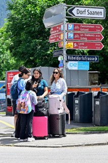Indian tourists with luggage