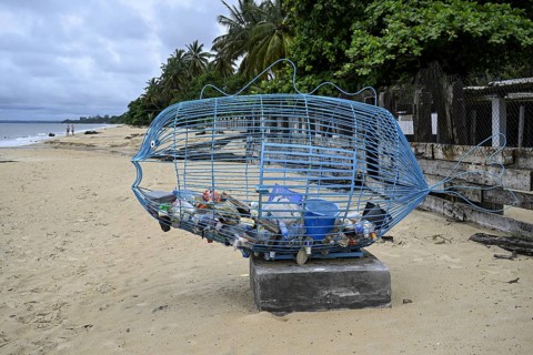 Container for washed up plastic waste on the beach, Libréville, Estuaire province, Gabon, Africa