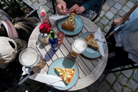Quiche and drinks on a bistro table in a street café, Nuremberg, Middle Franconia, Bavaria,