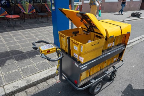 Postman's van in Nuremberg, Middle Franconia, Bavaria, Germany, Europe