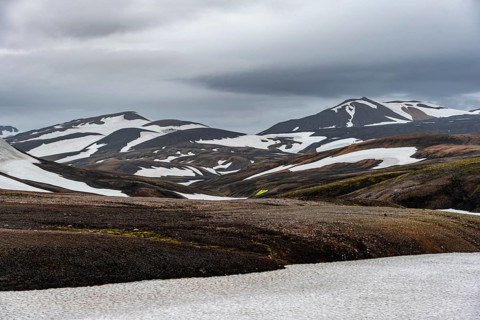 Volcanic landscape with hills and snow, Laugavegur trekking trail, Landmannalaugar, Fjallabak