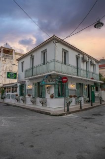 Great typical Greek town and buildings. Mediterranean cityscape in the evening at sunset on