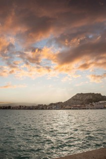 Great typical Greek town and buildings. Mediterranean cityscape in the evening at sunset on
