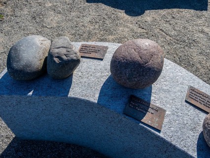 Exhibition of different rock types moved by glacial streams, beach Molen, west of Larvik, Norway,