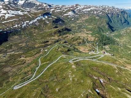 Aerial view of mountain crossing Sognefjellsvegen, serpentines near hotel Turtagro, Norway, Europe