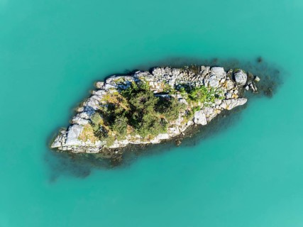 Top-down aerial view of island in the Lustrafjord, inner branch of the Sognefjord, near Dalsoren,