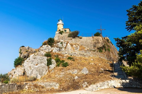 Lighthouse and cross on the top of the Old Fortress, Kerkyra, Corfu