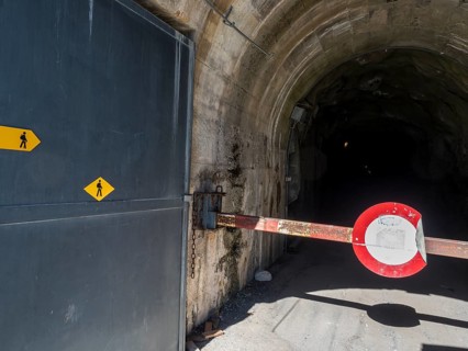 Hiking path along eastern shore of lake Emosson inside a tunnel, Lac de Emosson, Switzerland,