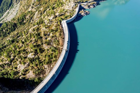 Aerial view of reservoir dam and lake lac d' Emosson, Finhaut, Switzerland, Europe