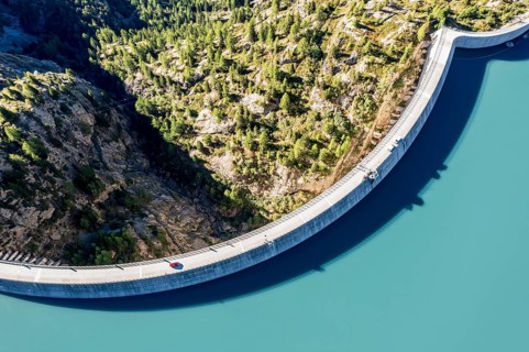 Aerial view of reservoir dam and lake lac d' Emosson, Finhaut, Switzerland, Europe