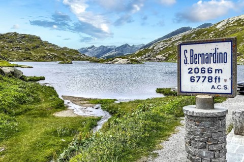 Pass marker sign at pass summit of mountain pass in Alps Passo San Bernardino San Bernardino Pass