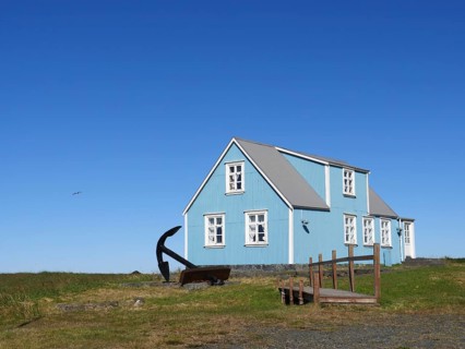 Blue house in Sandgerdi in the west of Iceland