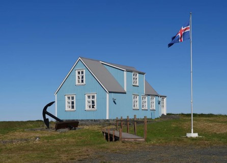 Blue house in Sandgerdi in the west of Iceland