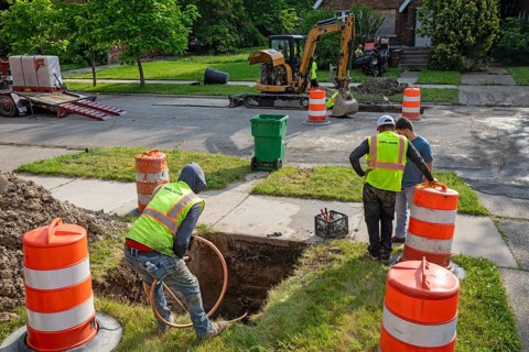 Detroit, Michigan, Workers replace old lead water service lines with copper pipes. Lead is harmful