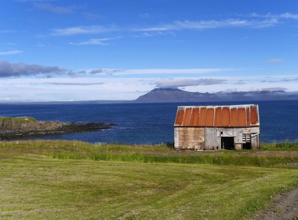 Coast with house in Iceland near Bakkafjordur