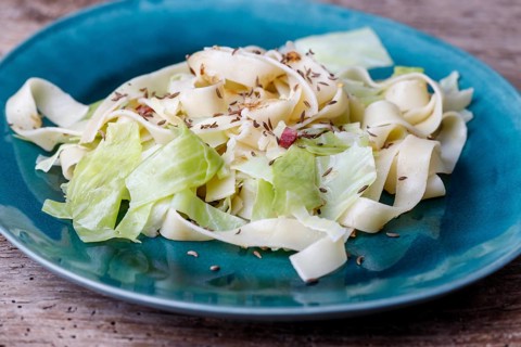 Bavarian cabbage salad on a blue plate