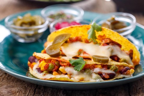 Mexican tacos baked with cheese