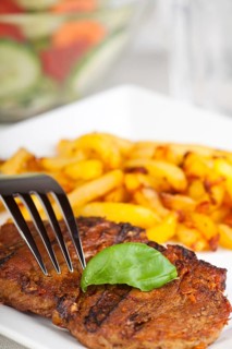 Juicy pork steak with chips