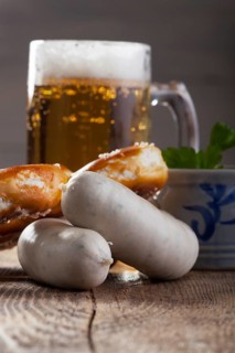 Bavarian veal sausage with pretzel and beer