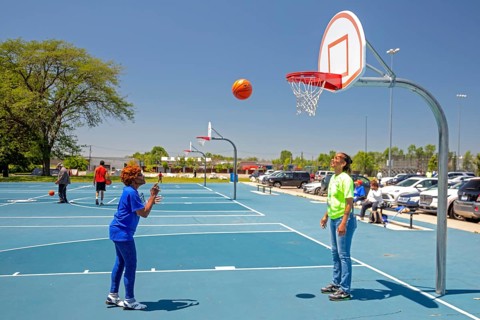 Detroit, Michigan, Rosie Randall, 85, competes in the Basketball Free Throw event at the Detroit