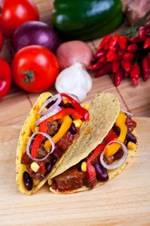 Tortilla filled with beans and meat sauce
