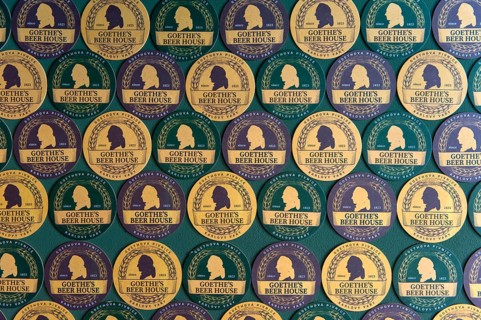 Beer mat with the portrait of Goethe as wall decoration in Goethe's Bierhaus, Karlsbad, Karlovy