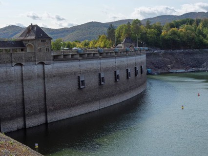 Massive dam impounding a river with neighbouring forest and hilly landscape, Waldeck, Hesse,