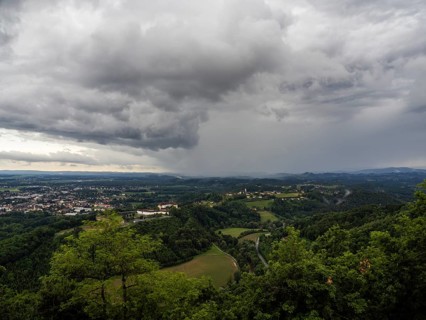 Storm clouds over Leibnitz, Seggau Castle, Frauenberg pilgrimage church in the background, view