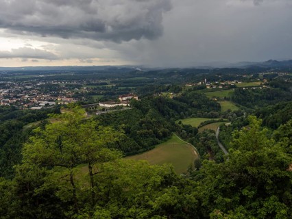 Storm clouds over Leibnitz, Seggau Castle, Frauenberg pilgrimage church in the background, view