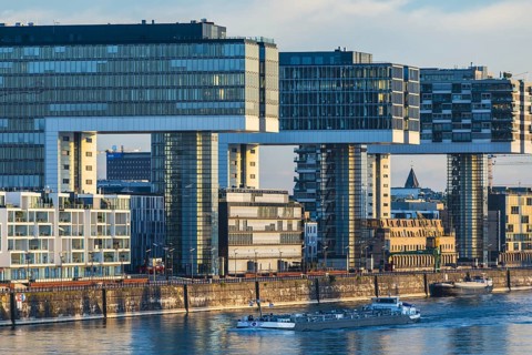 Crane houses in the Rheinau harbour, seen across the Rhine from the south bridge, Cologne, North