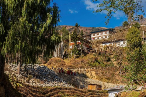 View of the Trongsa Dzong on a sunny day with blue sky