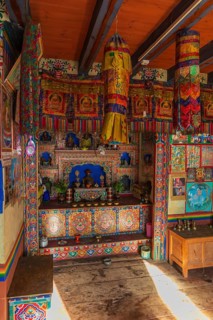 Colorful altar in a private house in Phobjikha