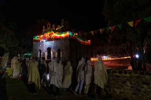 People gathering at Timkat festival at Fasilides Bath in Gondar, Ethiopia, Africa