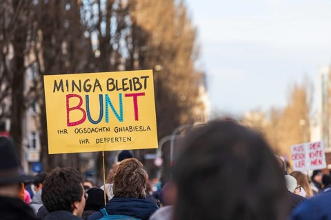 People holding banners against the right wing party AfD at a manifastation in Munich, Germany,