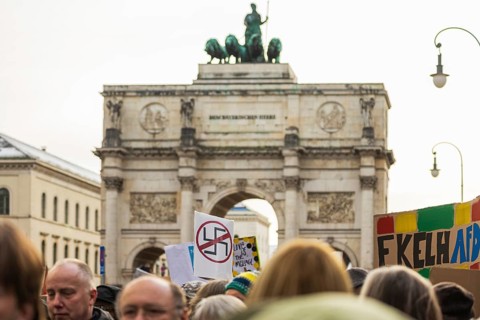 People holding banners against the right wing party AfD at a manifastation in Munich, Germany,