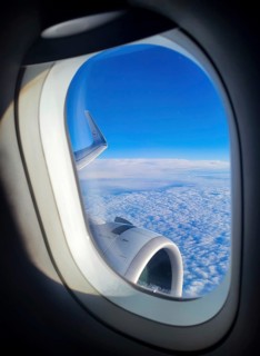 View of a Lufthansa Airbus A380 wing with turbine in flight