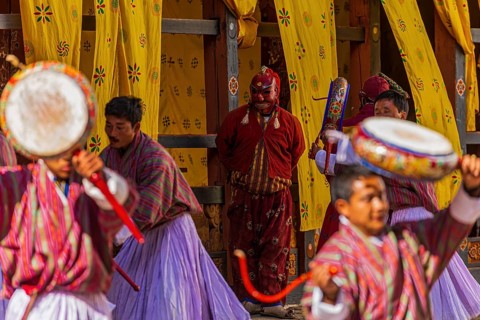 Monks danzing for the Tsechu at Trongsa Dzong