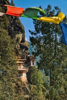 View of Taktshang Monastery through prayer flags