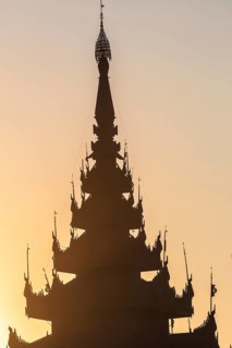 Pagoda silhouette during a sunset in Mandalay, Myanmar (Burma)