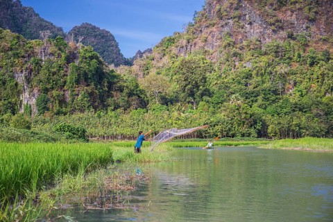 Man throwing out his net