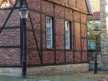 Half-timbered house with lanterns and windows in autumn, on cobblestones, nottuln, münsterland,