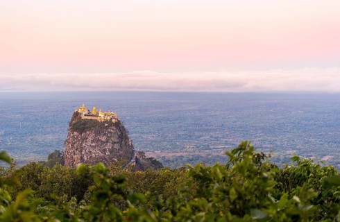 Taung Kalat Monastery seen from Mt. Popa Resort in Myanmar at dusk