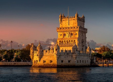 Lisbon's Belem tower at sunset seen from Tagus side