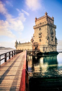 Belem Tower with bridge right before sunset