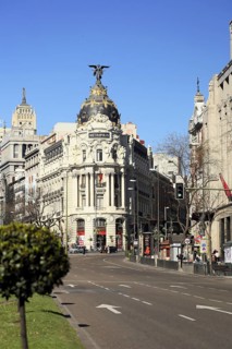 The city center of Madrid, Spain. View of the Gran Via and one of the most emblematic buildings in