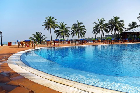 Luxurious Hotelpool in Mount Lavinia. In the background the skyline of Colombo