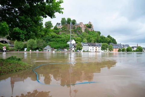 Flood of the river Saar, Saarburg in Saarland, Germany, flooded trees and paths, high water level,