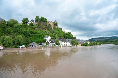 Flood of the river Saar, Saarburg in Saarland, Germany, flooded trees and paths, high water level,