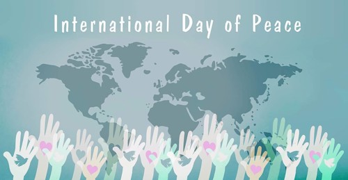 Hand with dove and heart, international peace day, faith, freedom, charity and help concept,